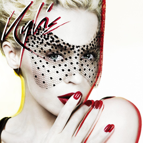 Omot albuma Kylie Minogue - X (2007) sa portretnom fotografijom pjevačice na bijeloj pozadini. 