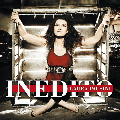 Omot albuma Inedito – Laura Pausini sa fotografijom umjetnice u kutiji sa tamnom pozadinom.