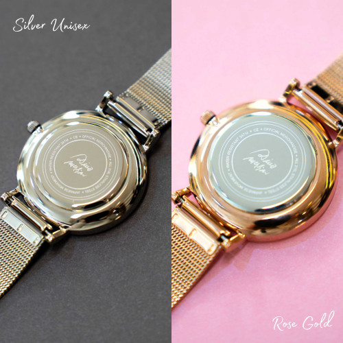 Rose gold i silver poleđina ručnih satova iz Dino Merlin kolekcije na sivoj i rozoj pozadini. 